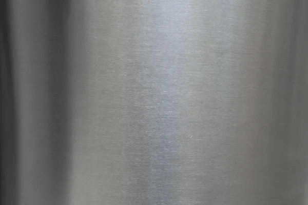 Structure of a stainless steel background in the form of a vertical cylinder.