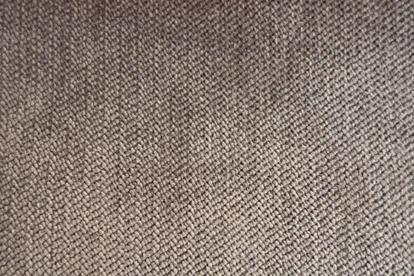 Tasarım ve dekorasyon için desenli arka plan yüzeyi olarak döşemelik kumaş dokusuna.