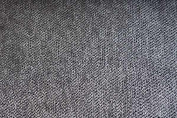 Tasarım ve dekorasyon için desenli arka plan yüzeyi olarak döşemelik kumaş dokusuna.