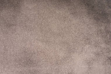 Gri süet kumaş closeup ışık. Kadife doku arka plan