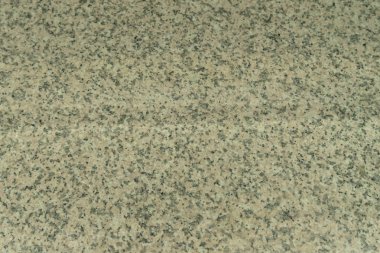 Gri bej granit yapısı. Doğal bir taş. Restoranda endüstriyel granit tezgah.