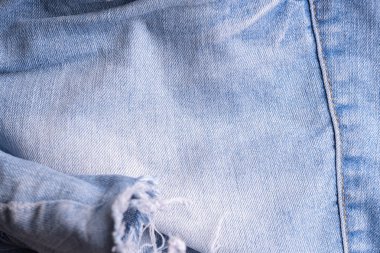 Mavi kot. Pamuklu kumaş, kot pantolon. Yaratıcı vintage arka plan. P