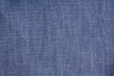 Mavi kot. Pamuklu kumaş, kot pantolon. Yaratıcı vintage arka plan.