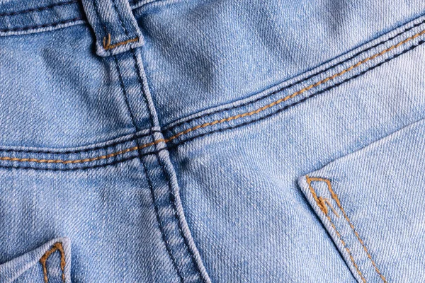 Blue Denim. Baumwollstoff, Jeans. kreativer Vintage-Hintergrund. p — Stockfoto