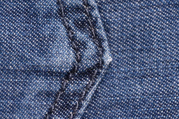 Blue Denim. Baumwollstoff, Jeans. kreativer Vintage-Hintergrund. p — Stockfoto