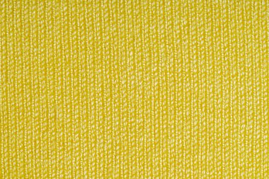 Örme kumaş yapısı Sarı yeşil renk. Yaratıcı vintage arka plan.