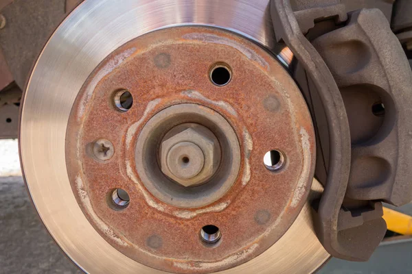 Brake disc and car caliper. The picture with the wheel removed f