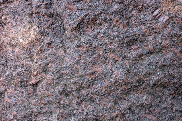 The structure of red and black granite. The texture of natural s — Stock Photo, Image