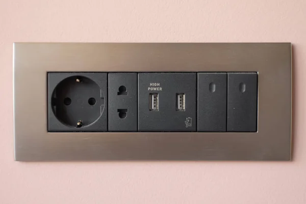 Beautiful sockets and black switches in various combinations with an aluminum frame. USB port.