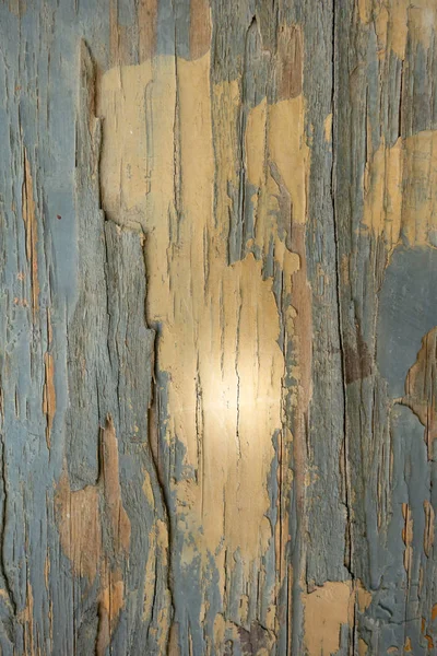 Old cracked paint on a gray wood panel. Creative vintage natural — Stock Photo, Image