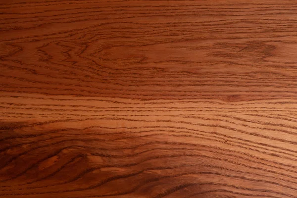 The structure of natural ash wood, tinted oak. Hardwood. Creative vintage background. Imitation of aging