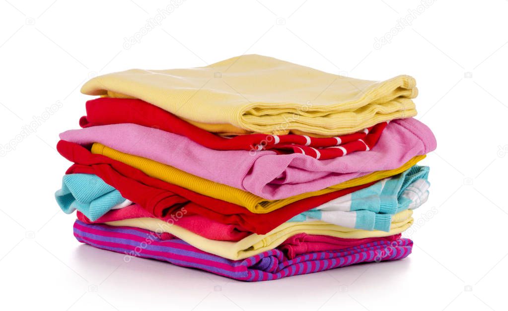 Pile of colorful clothes, isolated white background 