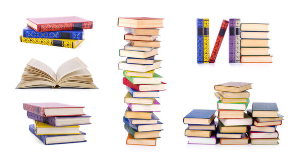 Коллекция старинных книг, выделенных на белом фоне
 
