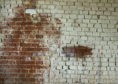 Arka plandaki eski tuğla duvar