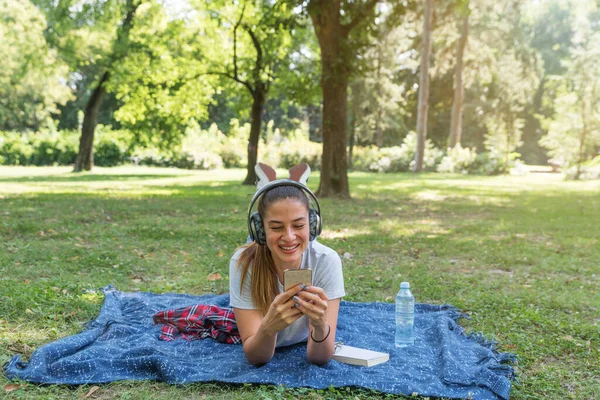 Young Beautiful Girl Lying Park Blanket Having Fun Wireless Headphones — Stock Photo, Image