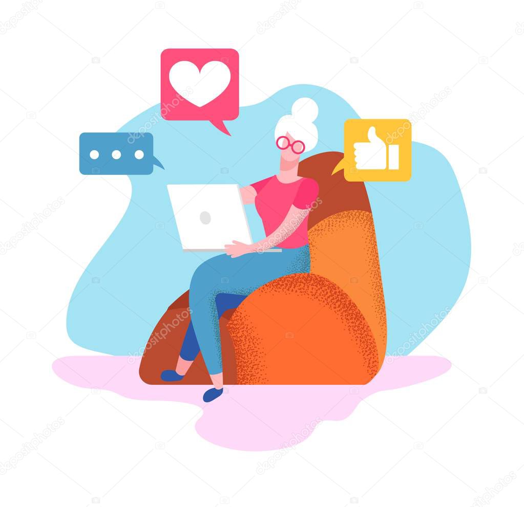 Senior Woman Sit on Armchair at Home with Laptop