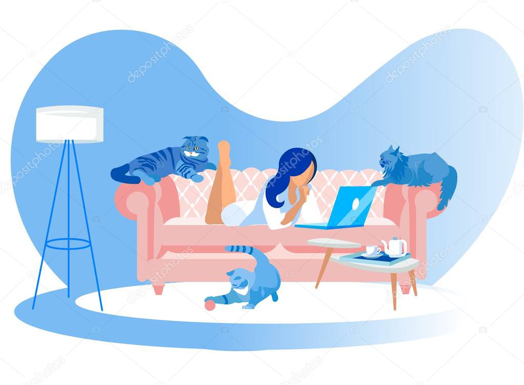 Woman Lying on Couch with Laptop and Cats around