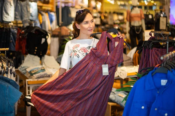 Young Attractive Woman Choosing Clothes Dress Fashion Store Concept Shopping — Stock Photo, Image