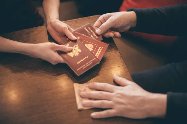 Male Female Hands Passports Money Table Concept Illegal Immigration Sale — Stock Photo, Image