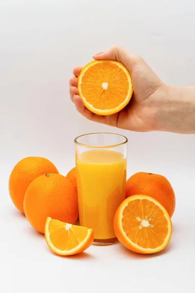 orange juice, oranges and hand with orange