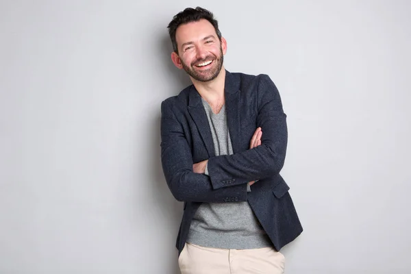 Portrait Handsome Man Beard Laughing Arms Crossed Gray Background — Stock Photo, Image