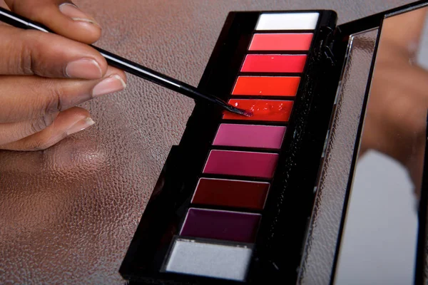 Close Portrait Lip Gloss Color Palette Woman Holding Makeup Brush — Stock Photo, Image