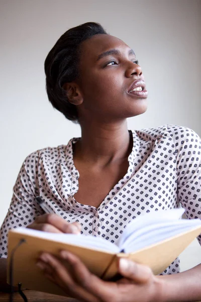 Close Portrait Black Female Author Thinking Writing Notebook — Stock Photo, Image