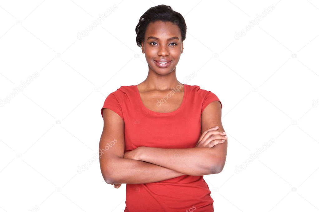 Portrait of smiling african american woman standing with arms crossed