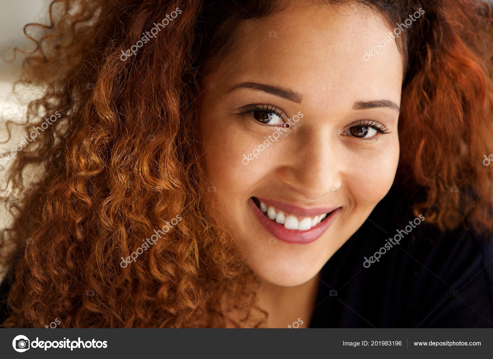 Close Portrait Beautiful Mixed Race Woman Curly Hair Smiling