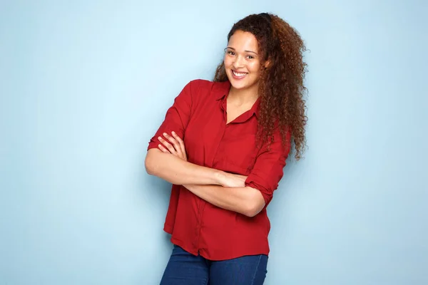 Portrait Young Woman Smiling Arms Crossed Blue Wall — Stock Photo, Image
