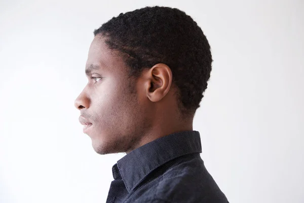 Profiel Portret Van Jonge Afrikaanse Man Tegen Witte Achtergrond — Stockfoto