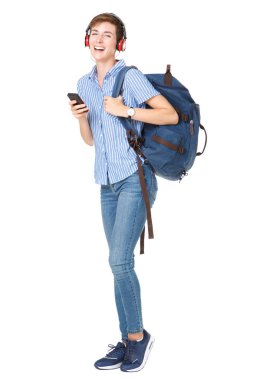 Tam uzunlukta olan cep telefonu kulaklık ile müzik dinlemek mutlu kadın portresi