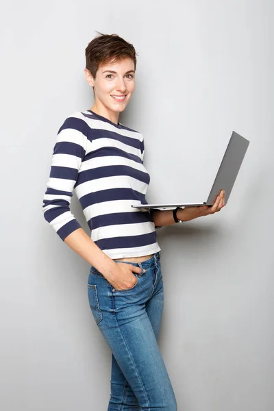 Portrait Smiling Young Woman Holding Laptop Computer Gray Background — Stock Photo, Image