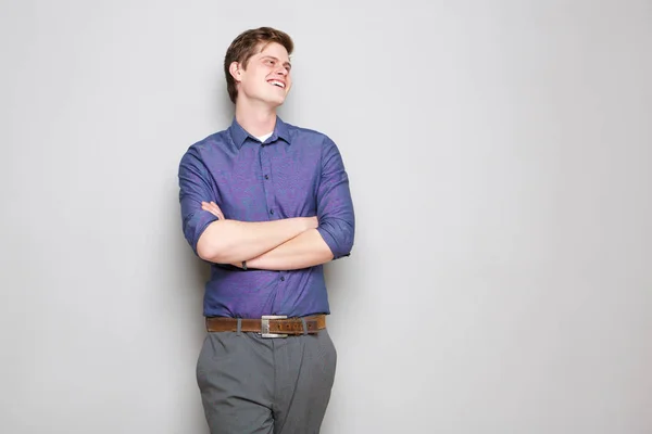 Portrait Happy Young Man Standing Gray Wall Arms Crossed — Stock Photo, Image