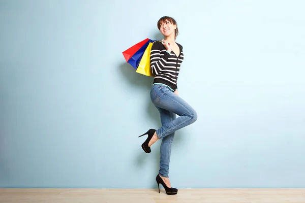 Full Body Portrait Happy Young Woman Shopping Bags Blue Background — Stock Photo, Image