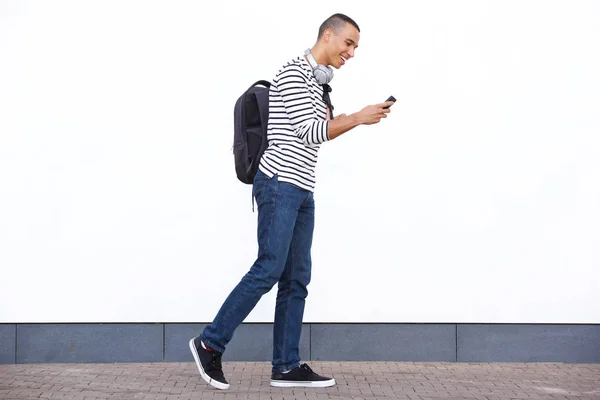 Full Body Profile Portrait Young Man Walking Looking Cellphone White — Stock Photo, Image