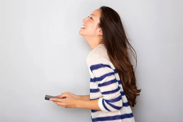 Side Portrait Pretty Asian Woman Smiling Smart Phone Gray Background — Stock Photo, Image