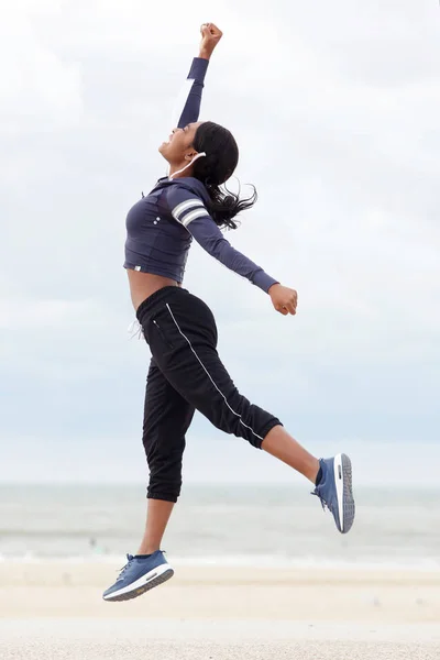 Full Body Portrait Sporty African American Woman Jumping Hand Raised — Stock Photo, Image