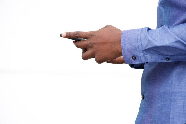 Close up african american male hands holding mobile phone against white background