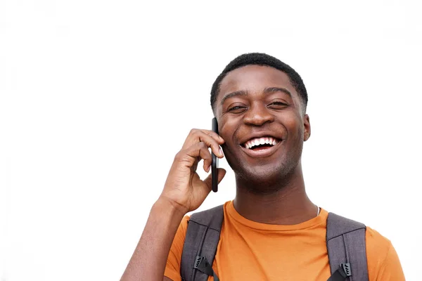 Närbild Porträtt Unga Afroamerikanska Man Skrattar Med Mobiltelefon Mot Isolerade — Stockfoto