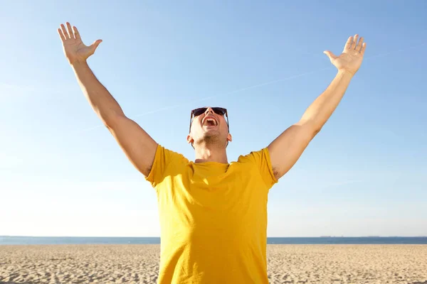 Portrait Happy Carefree Man Cheering Arms Raised Beach — Stock Photo, Image