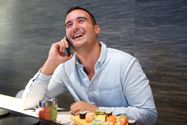 Portrait Happy Man Talking Mobile Phone Sushi Restaurant — Stock Photo, Image