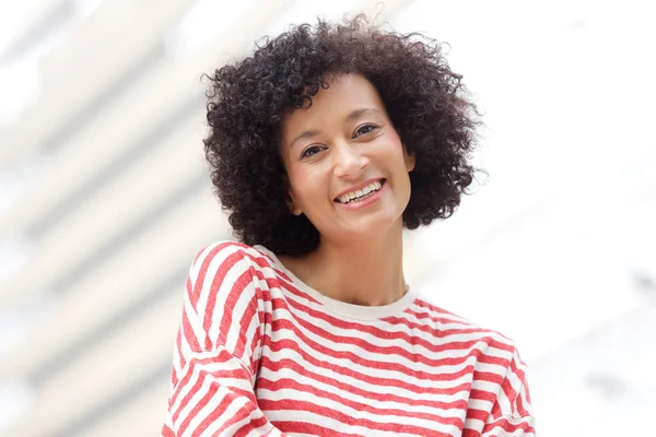 Close up portrait of older african american woman smiling outdoors