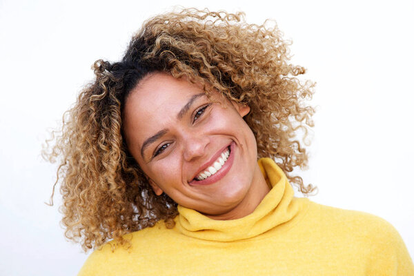 Close up horizontal portrait of smiling african american woman against isolated white background