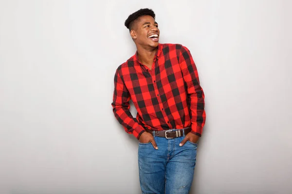 Portret Van Jonge Zwarte Man Tegen Grijze Achtergrond Lachen Weg — Stockfoto