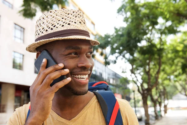 Close Portrait Smiling Black Man Hat Talking Cellphone — Stock Photo, Image