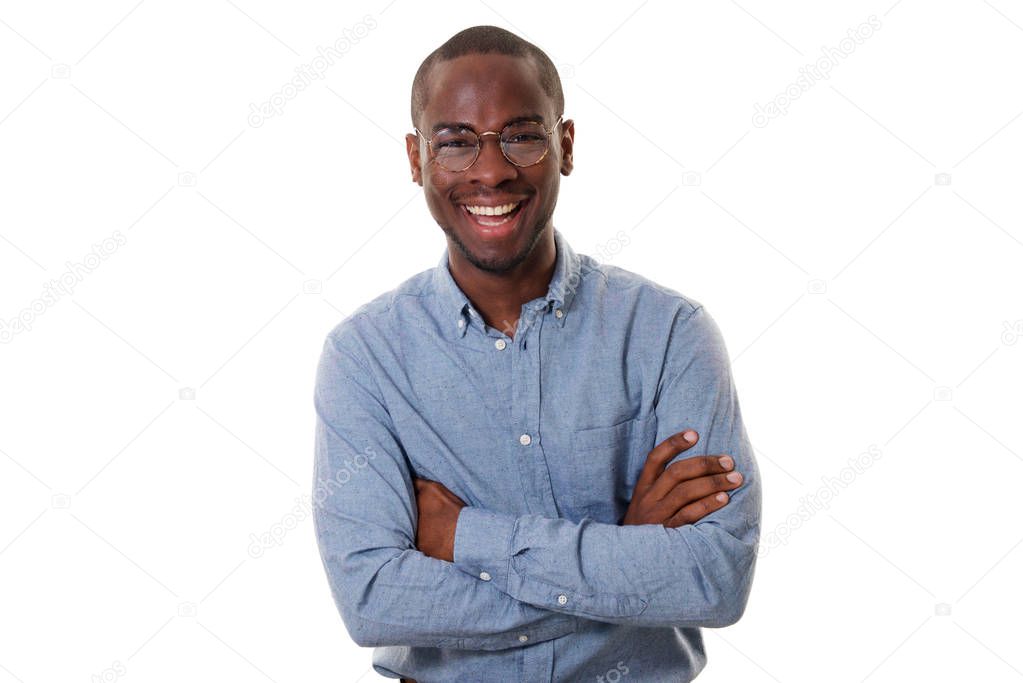 Portrait of young african american businessman with glasses smiling with arms crossed against isolated white background