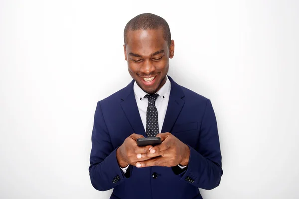 Portrait Smiling African American Businessman White Background Looking Mobile Phone — Stock Photo, Image