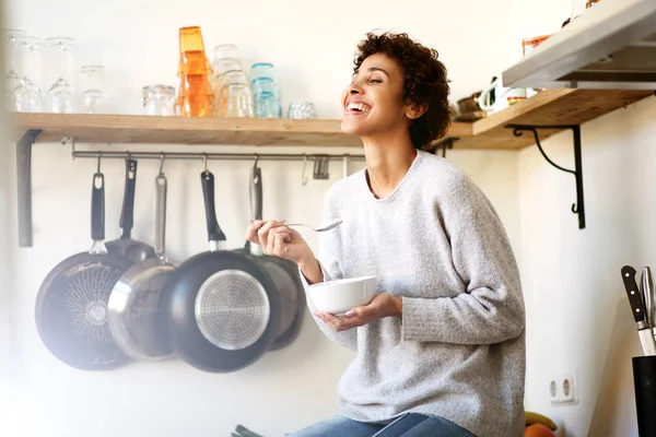 Portrait Happy Young Woman Eating Cereal Bowl Kitchen Home — Stock Photo, Image