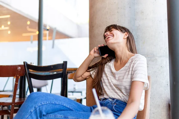 Portrait Happy Young Woman Sitting Cafe Talking Mobile Phone — Stock Photo, Image